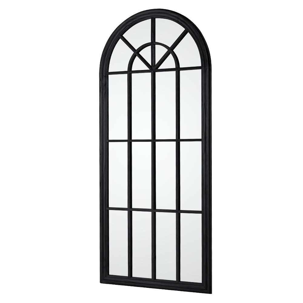 Arched window-style mirror with black frame on a white background