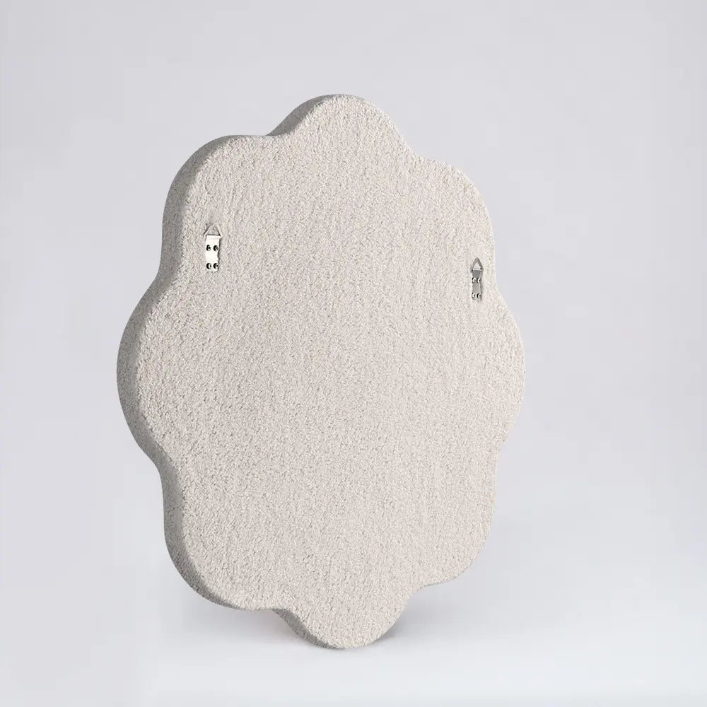 Wavy fabric-framed mirror back view