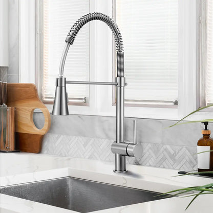 Vivi spring mixer tap with pull-down spout in modern kitchen in silver