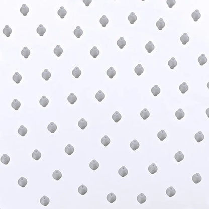 Close-up of the small water holes on the shower head.