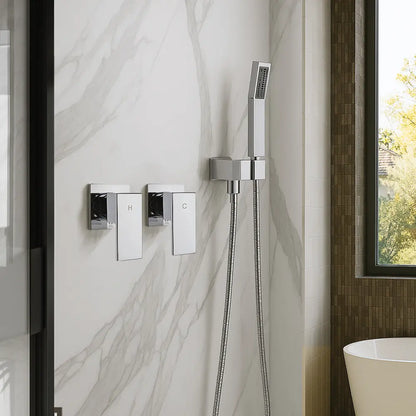 Chrome shower control panel and handheld shower head mounted on a marble wall.