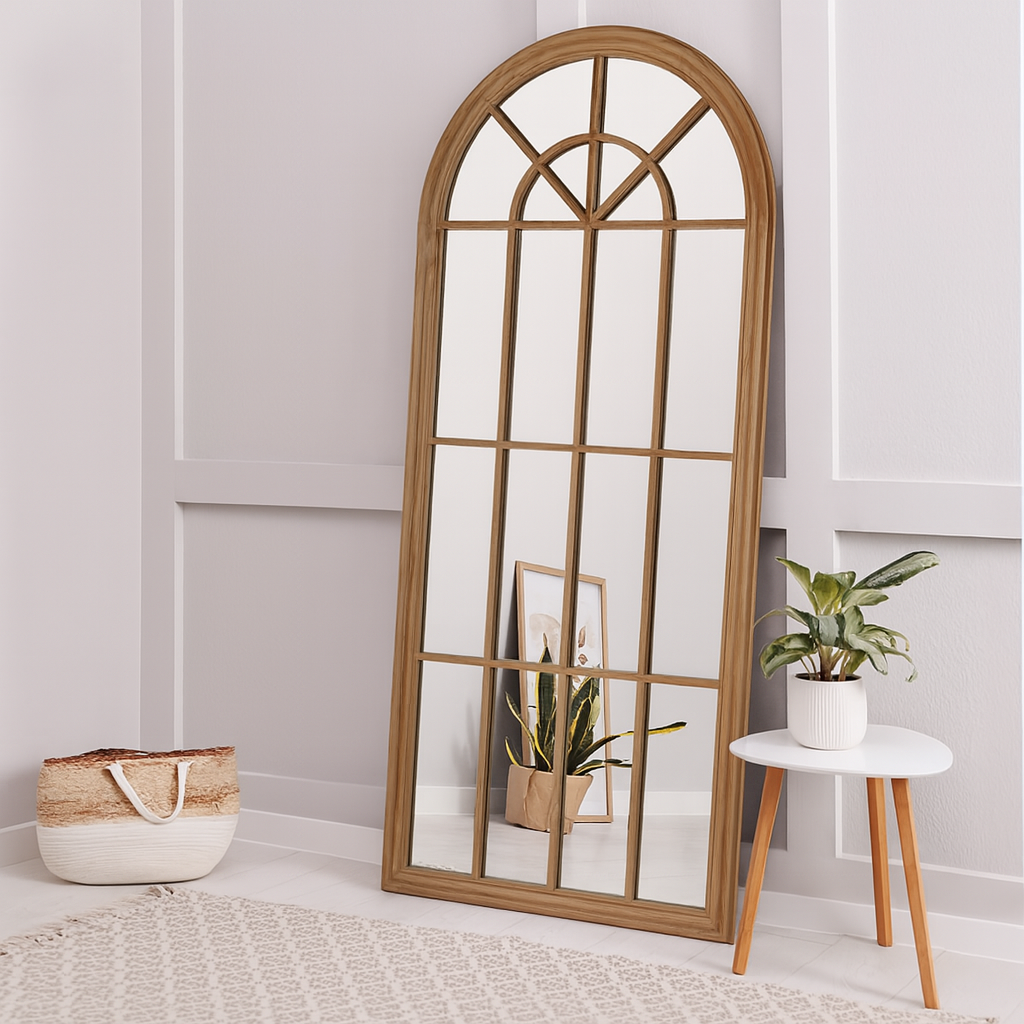 Wooden floor mirror with decorative elements in a room setting